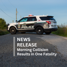 DPD police car blocking a road with News Release text overlay